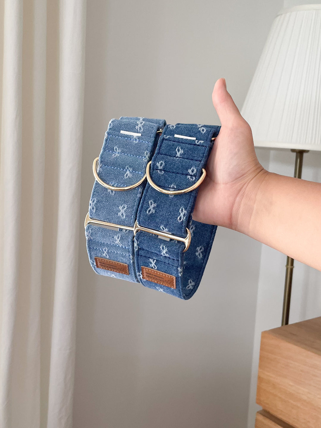 Dahound Denim Bow Greyhound Collar Lifestyle Product Photo With Hand